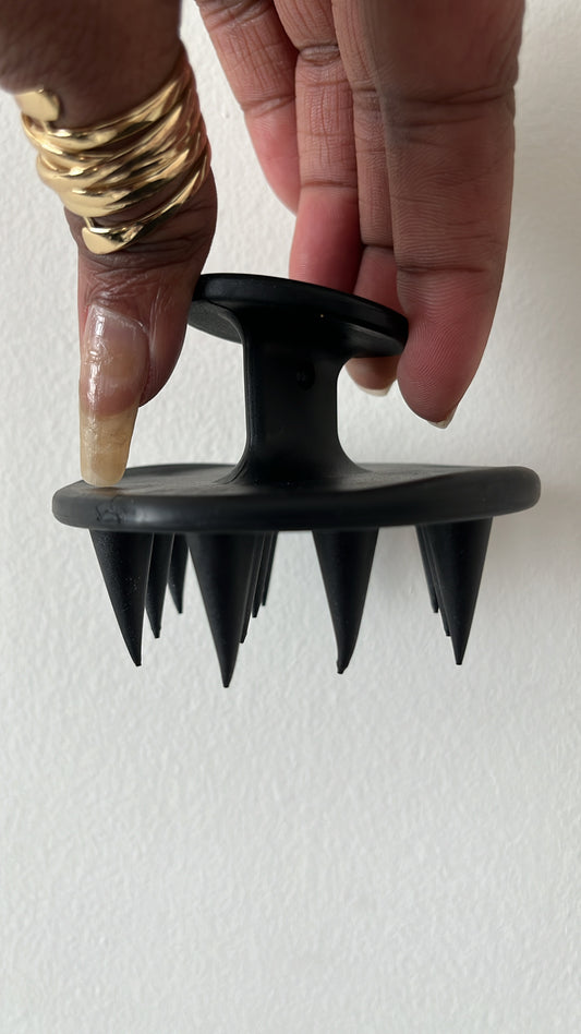 2 OZ BOTTLE OF INFUSED OIL AND 1 SCALP MASSAGER
